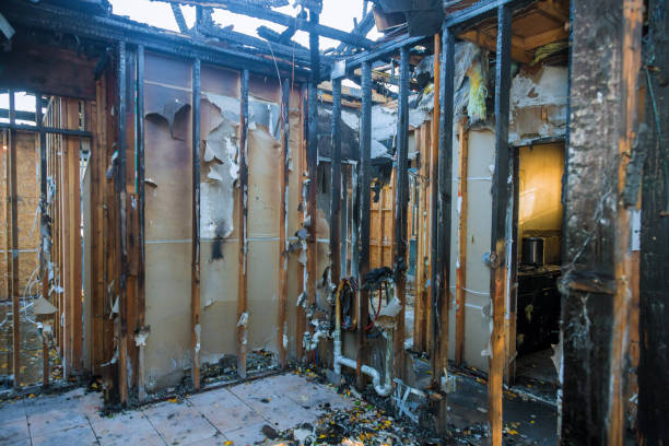 Professional Fire Damage Restoration technician working in Weatogue, CT